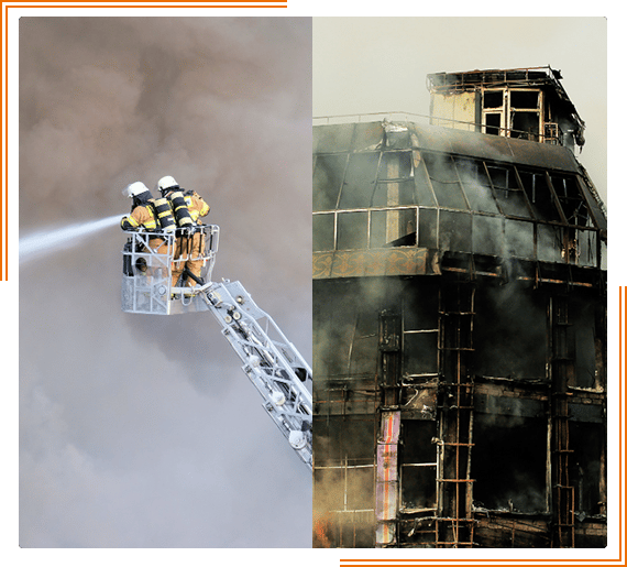 a firetruck spraying water on a building