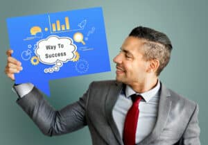 man holding success sign