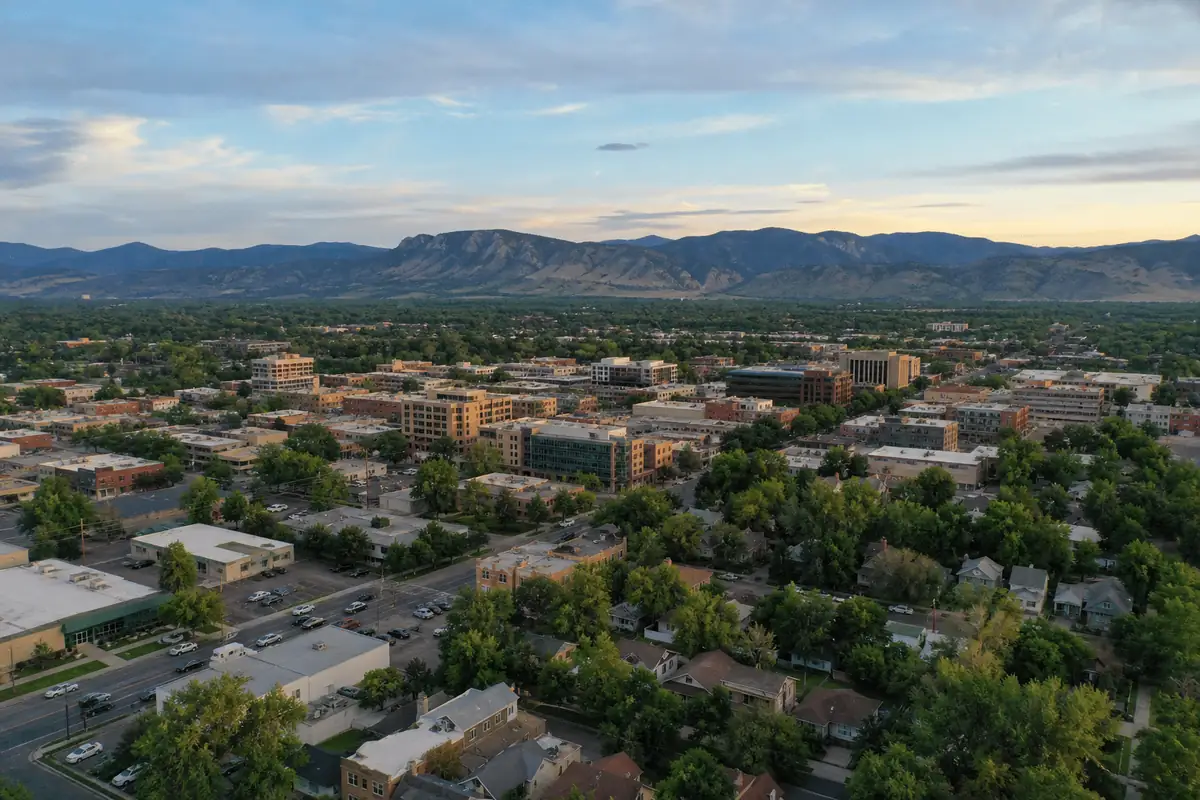 Local Drone Services in Fort Collins: A Complete Hiring Guide for Businesses 2 Aerial view of Fort Collins, CO at sunrise with the foothills behind