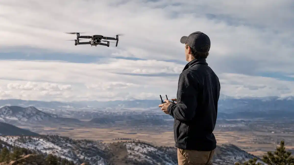 How Long Will a Drone Fly? What Fort Collins Operators Should Know 2 Pilot flying a drone above the plains near Fort Collins